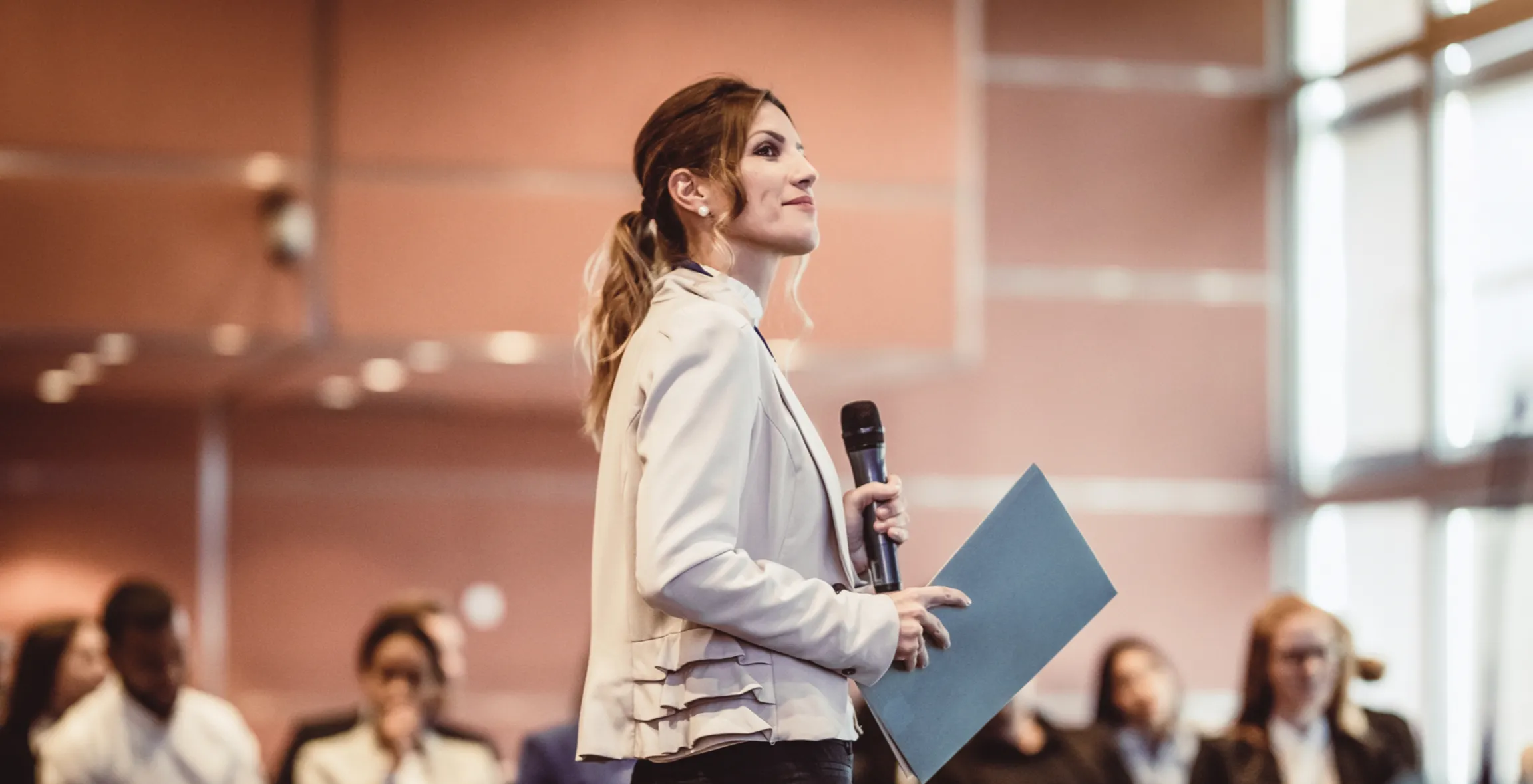 A diverse group of women collaborating in a meeting